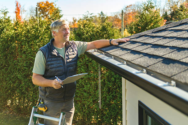 Professional Hail Damage Roof Repair technician working in Vail, CO